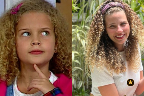 Debby Lagranha com cabelos presos, vestindo um uniforme de veterinária prático