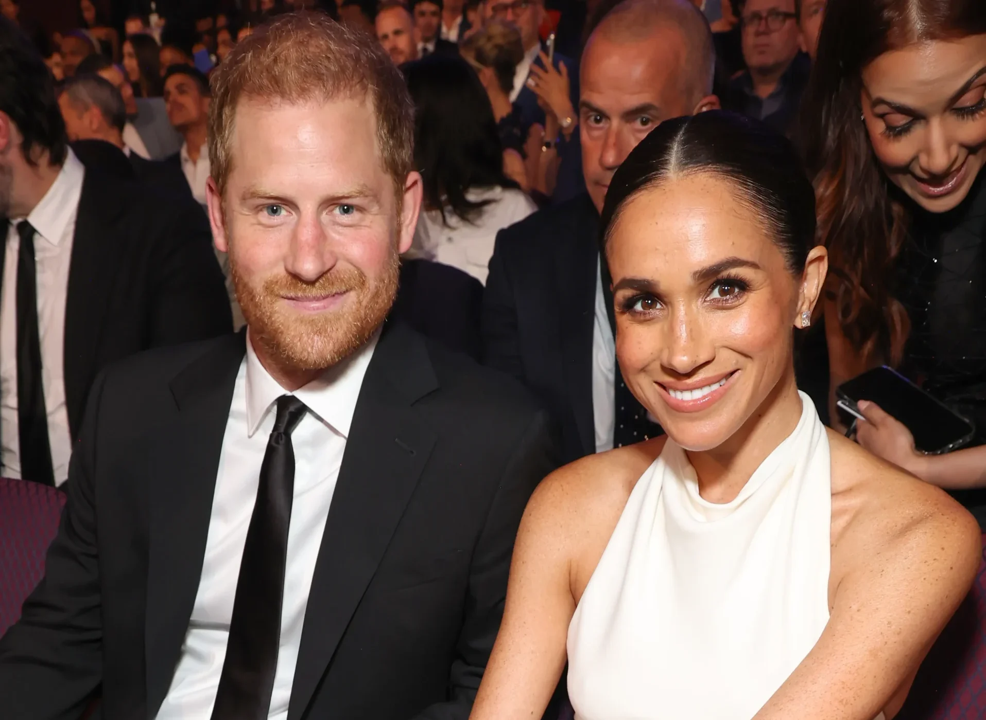 principe henrry e sua esposa